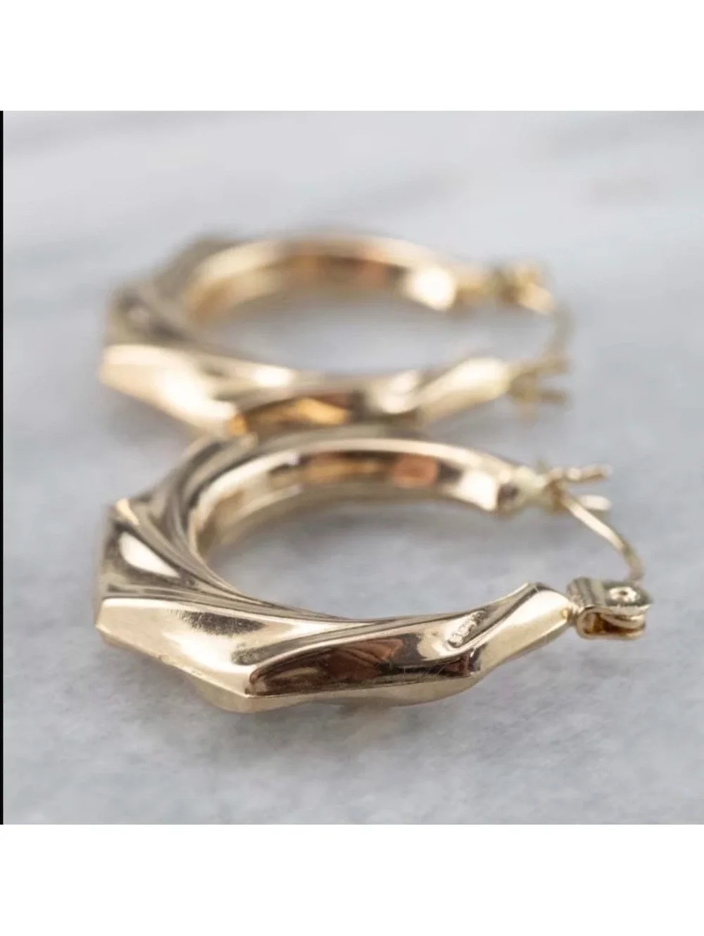 925 Sterling Silver posts gold twist earrings.